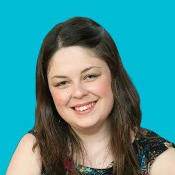 Anna Williams, type setter Smiling Anna with long dark hair, wearing a patterned top against a turquoise background.
