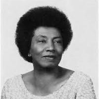 Undine Smith Moore - photographer unknown African American composer Undine Smith Moore circa 1960 with short dark hair wearing a beaded white top